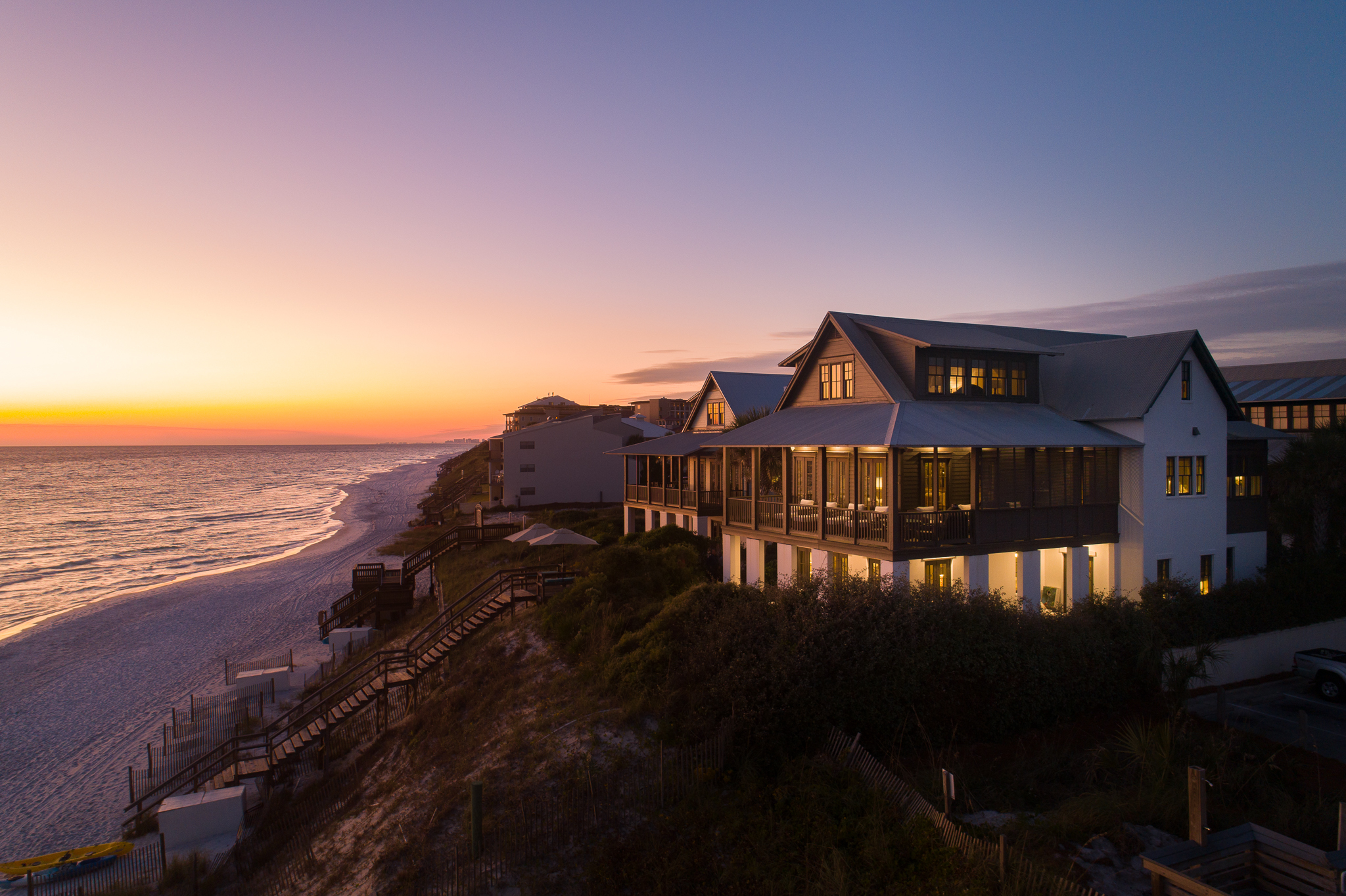 Beautiful sunset view of a gulf front home in Blue Mountain Beach